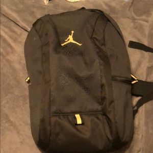 Jordan black and gold backpack